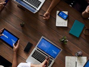 computers and notes on a desk